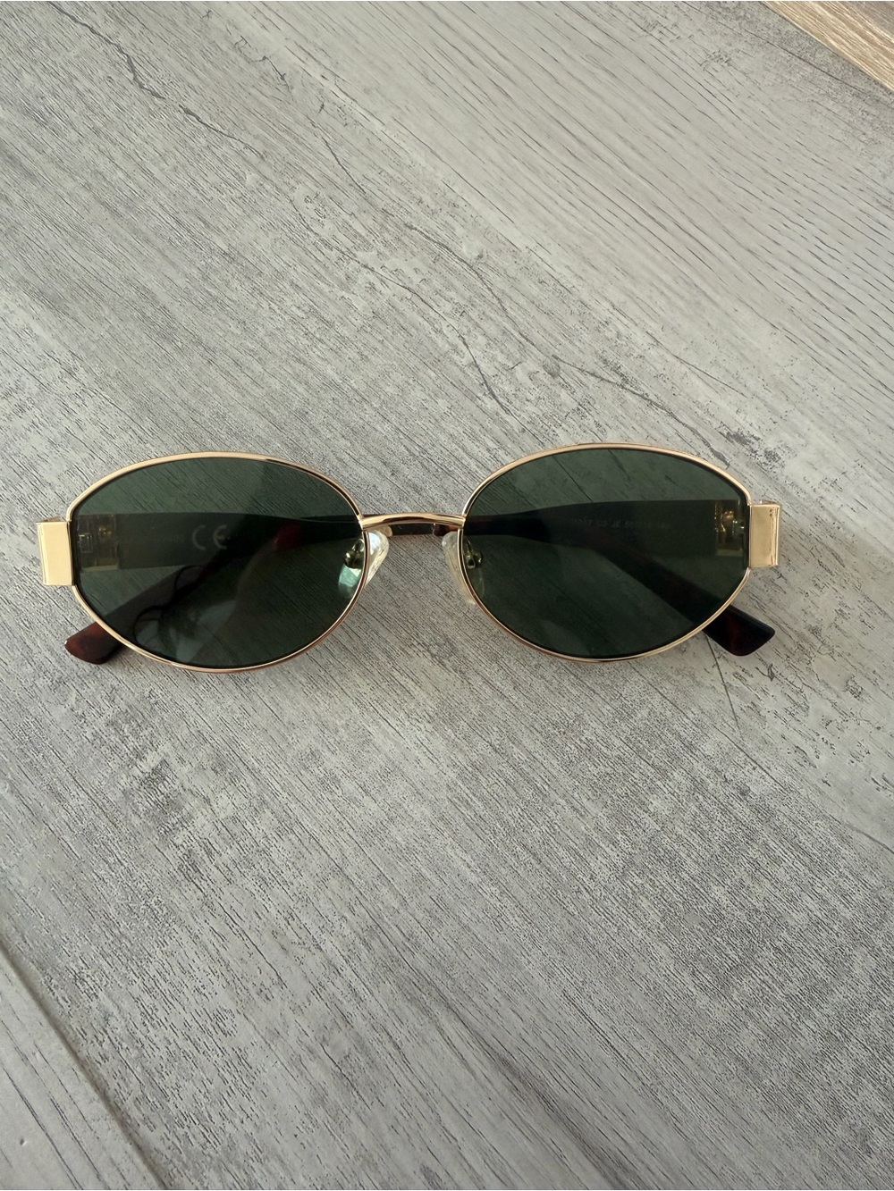 Gold Frame Oval Sunglasses with Green Lenses